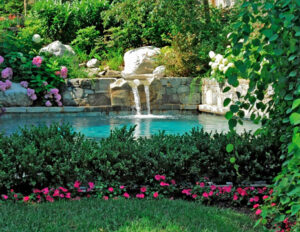 Pool with waterfall and natural stone