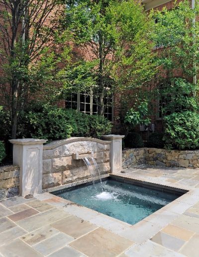 Built in stone spa with waterfall