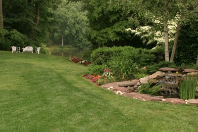 Perfectly tended to yard and garden beds